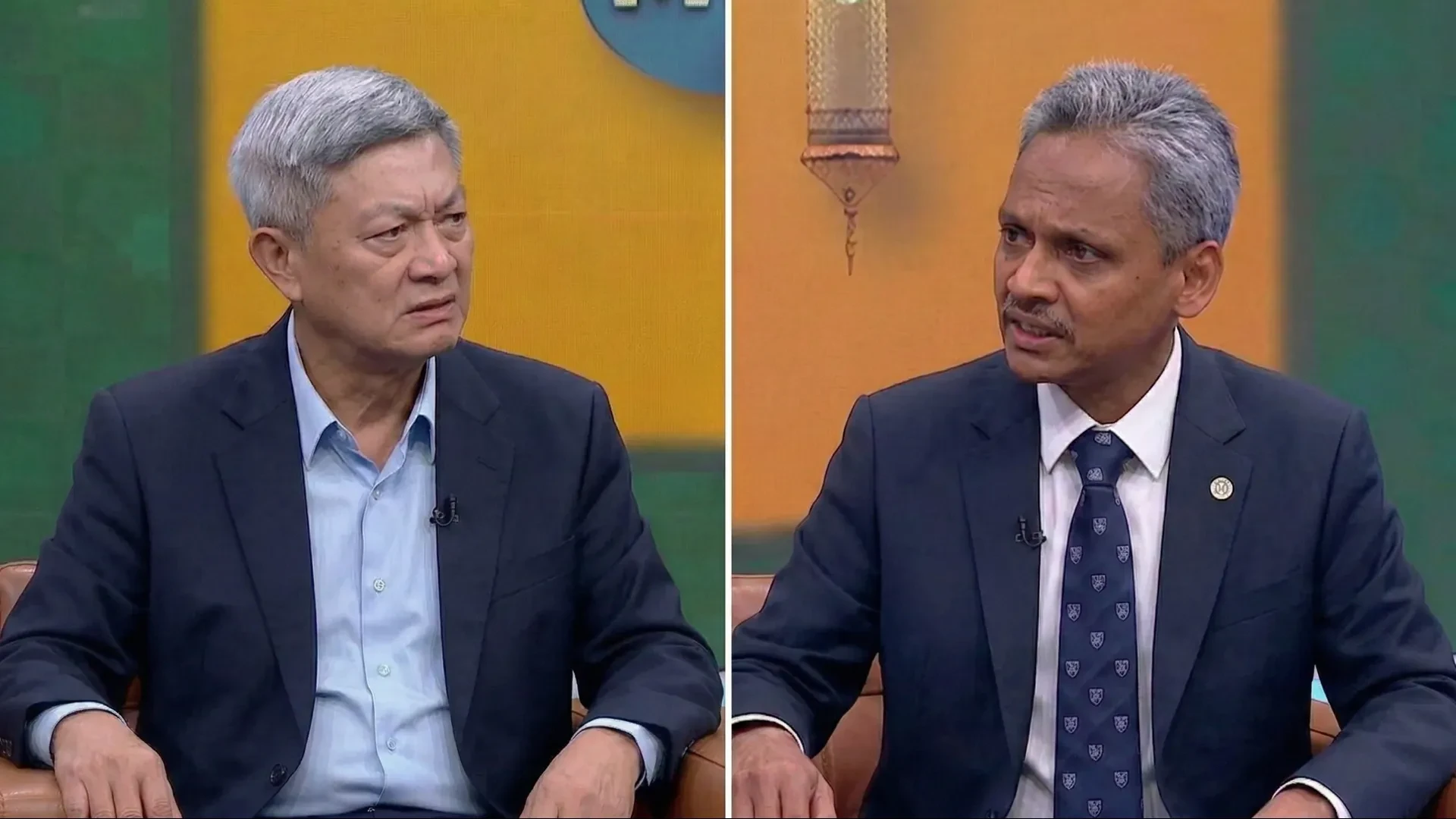 Two guests speaking in a studio discussion